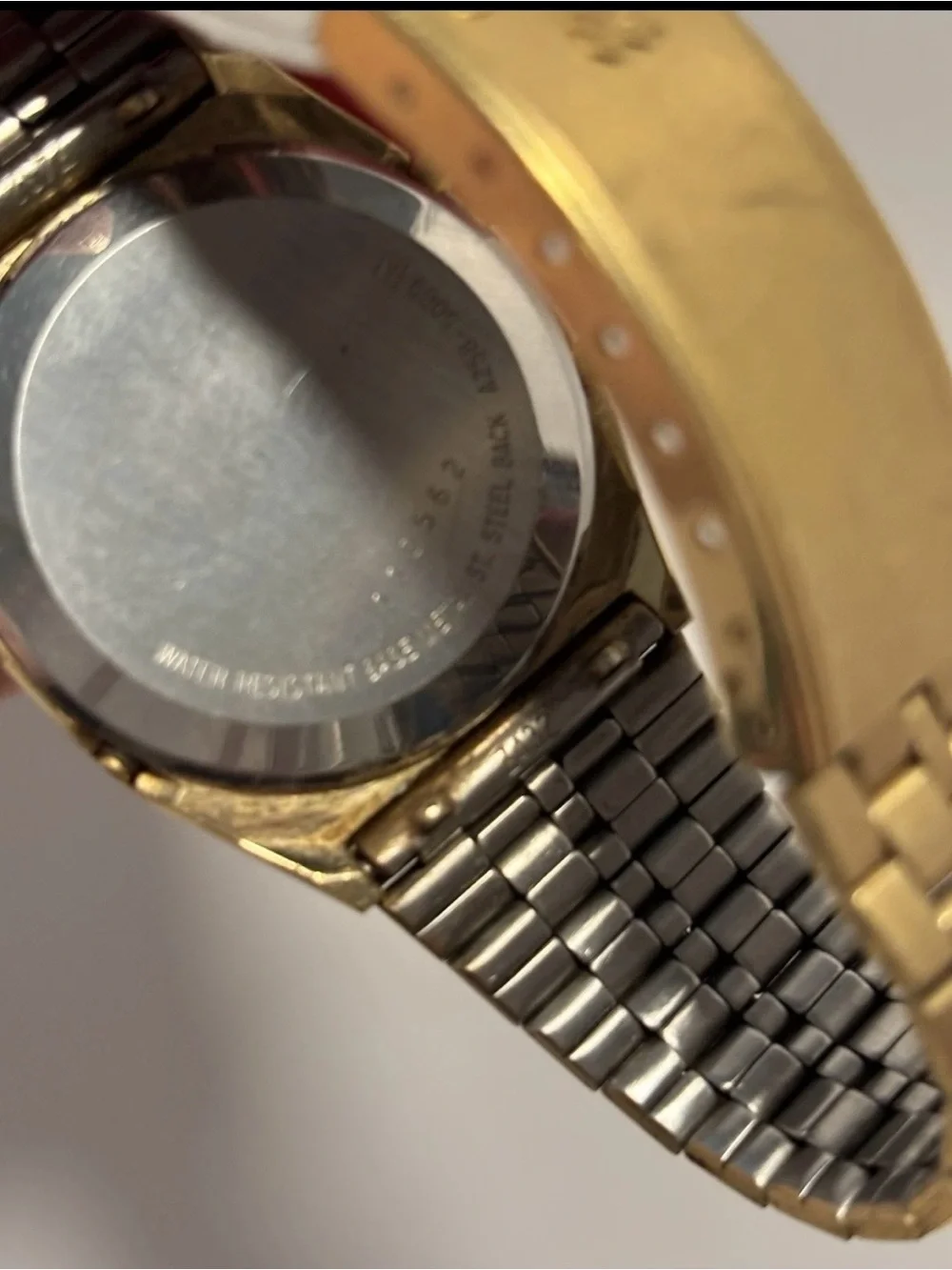 Seiko Men's Digital Quartz Wristwatch Gold Tone A258-5069 with solar panels.